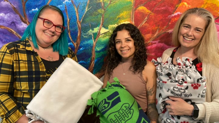 The Hampton Memory Care residents made blankets to help those in need