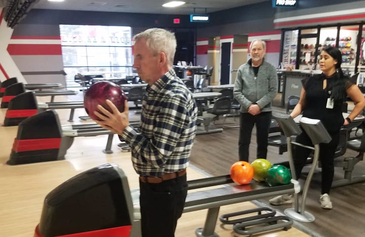 Harvester Place resident bowling