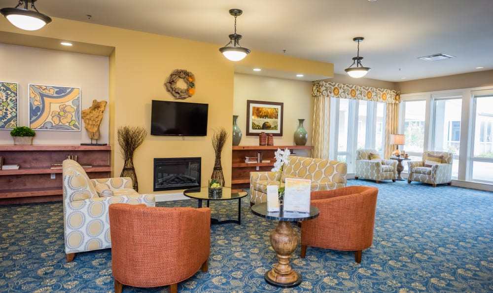 Fireplace lounge at Clear Creek Memory Care in Fayetteville, Arkansas