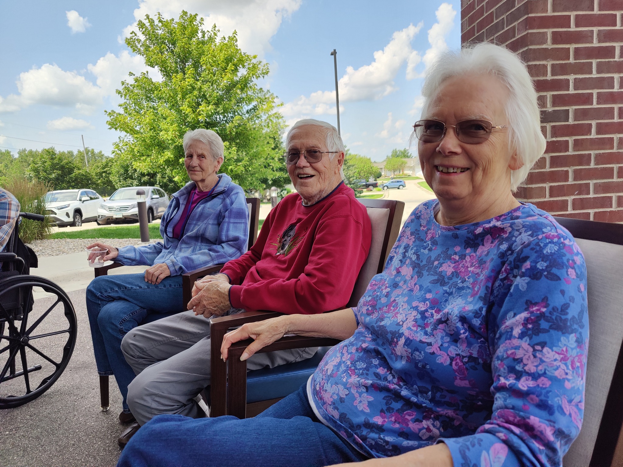 three residents enjoying the beautiful weather