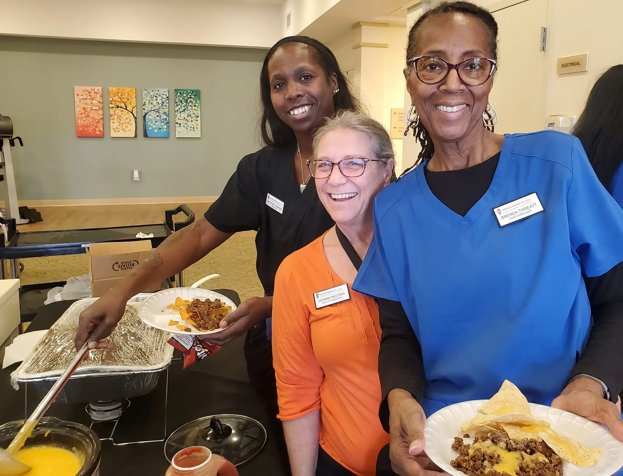 Grace Point Place staff enjoying a meal