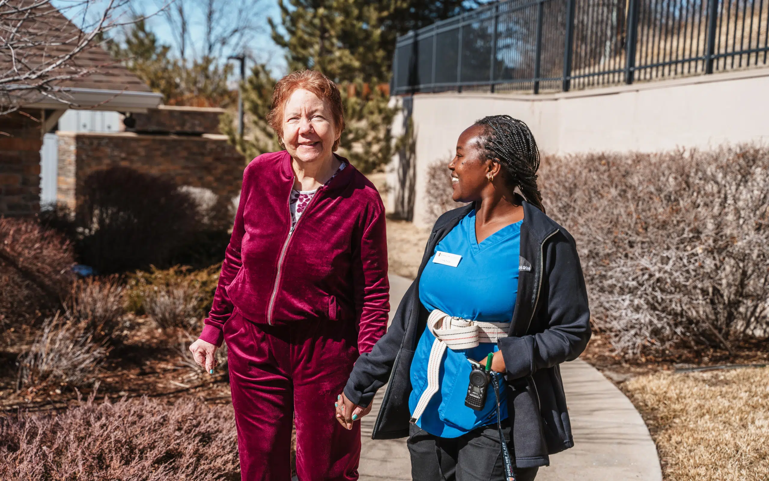 Two ladies talking and smiling