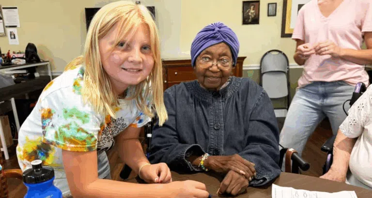 Chisholm Place Memory Care joins with local students to craft friendship bracelets for Texas flood volunteers