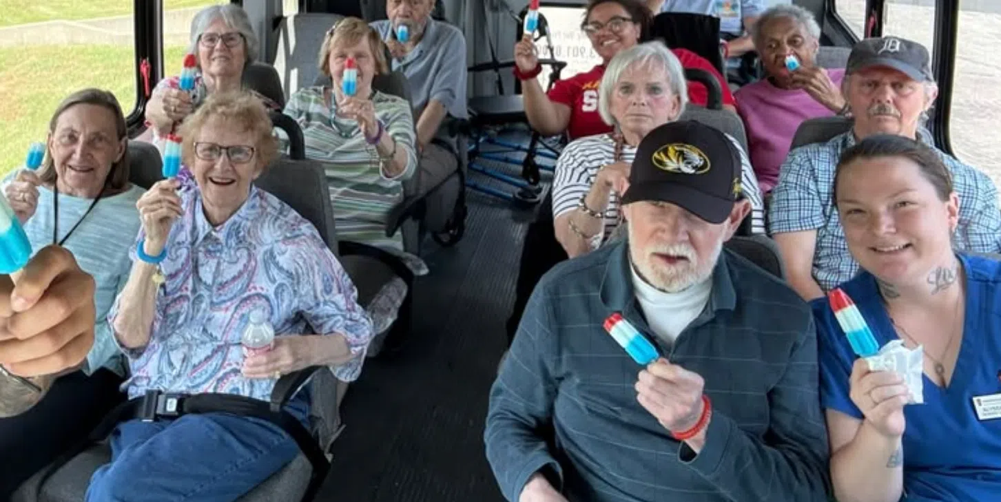 Morningside Place Memory Care residents enjoy popsickles during a scenic drive