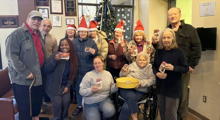 Concord Place Memory Care residents deliver homemade dog treats to local shelter