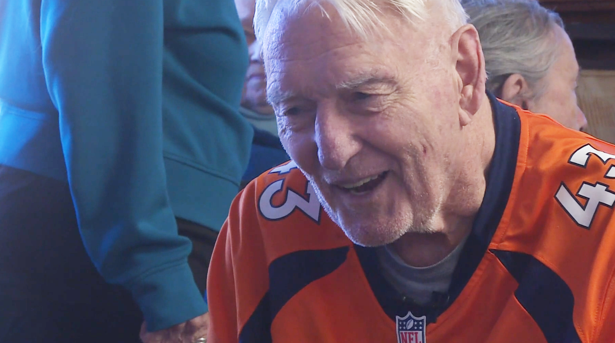 Bronco fans cheer on their favorite team at Greenridge Memory Care watch party in Westminster Colorado