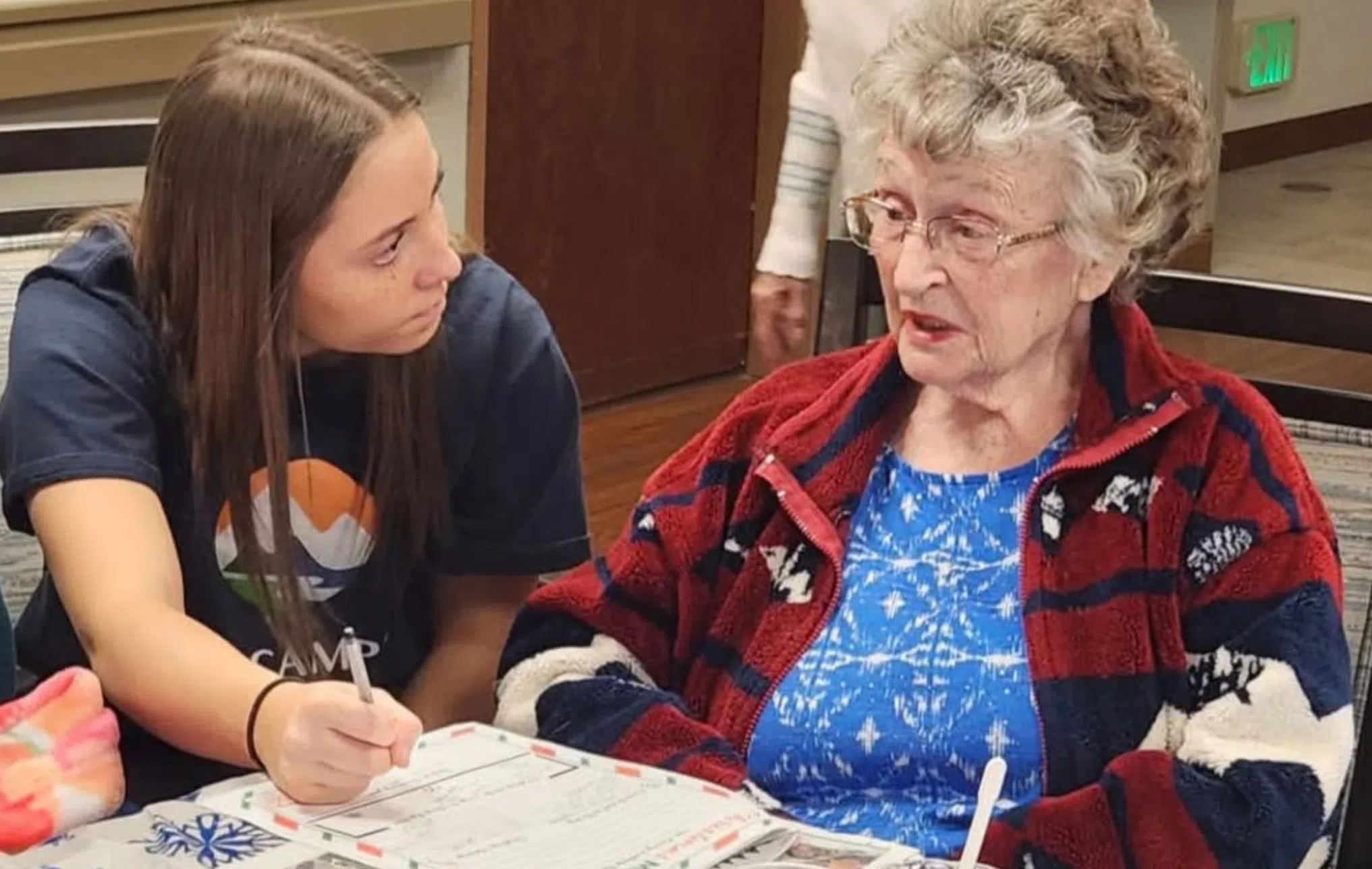 Highline Place Memory Care residents create Christmas Memory Journals with local students