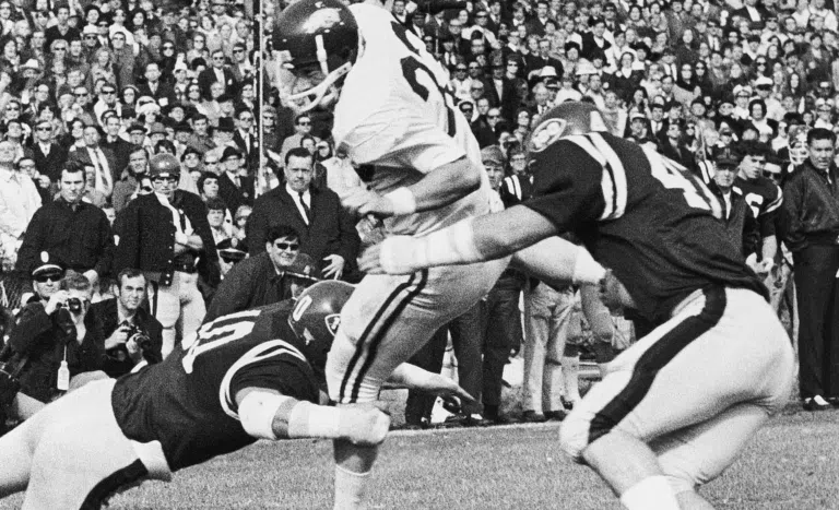 Bill Burnett Razordback football courtesy of AP and Northwest Arkansas Democrat Gazette