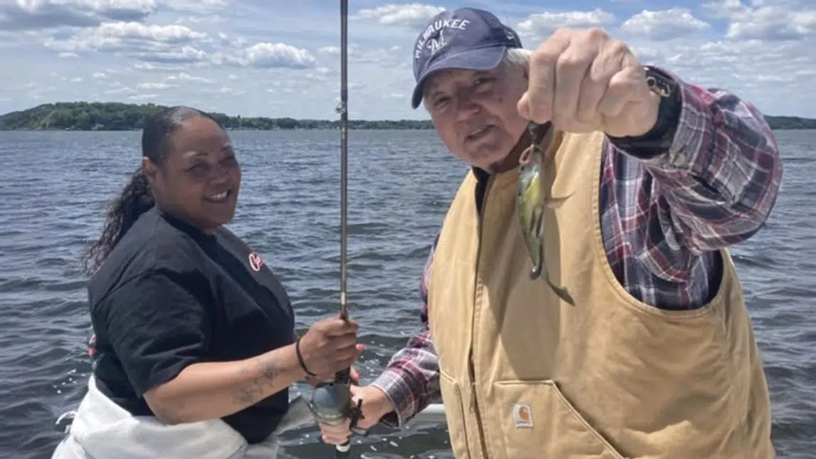 Franklin Place Memory Care resident goes fishing on the lake