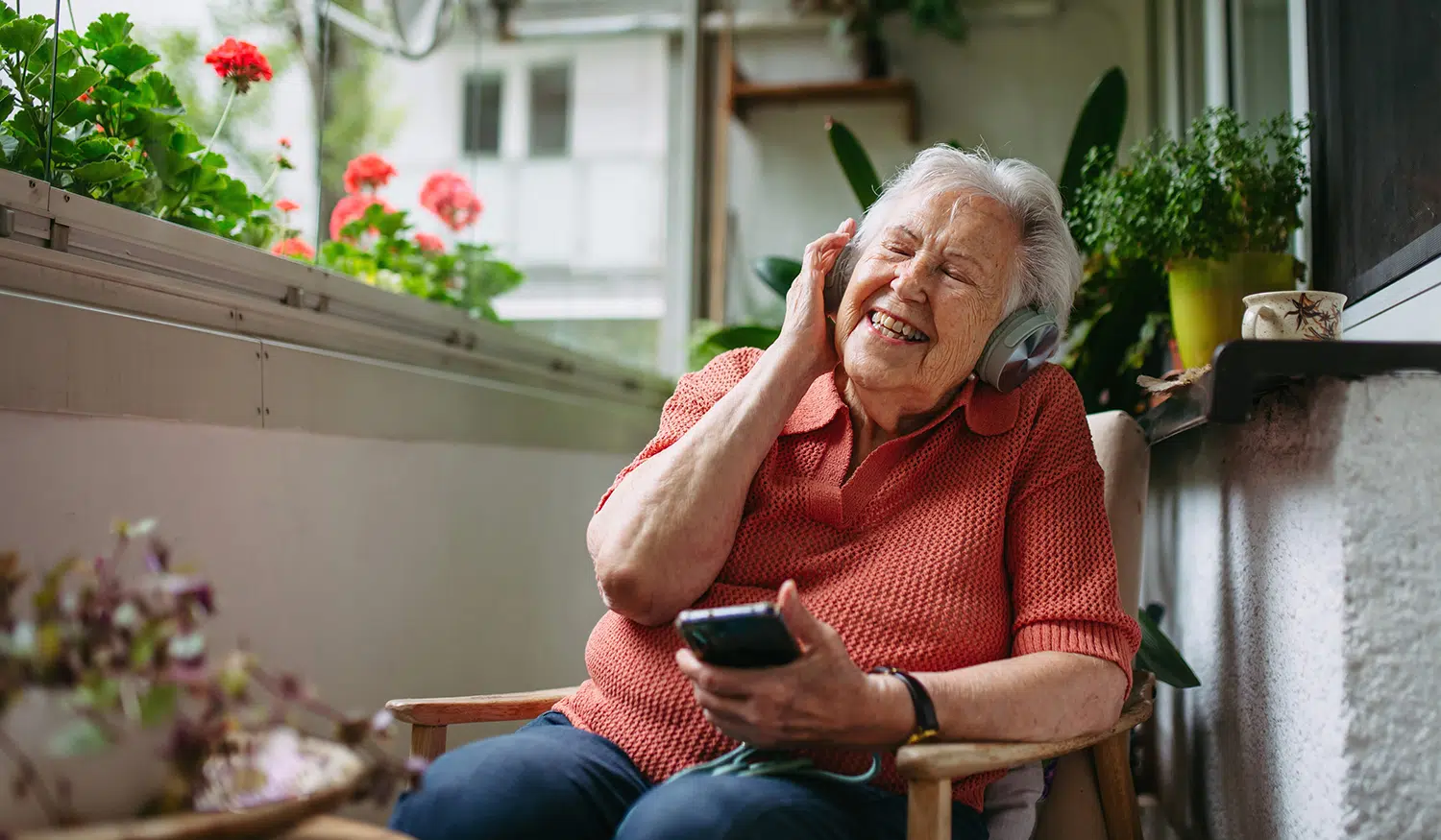 Elderly woman with dementia keeping in touch with loved ones remotely