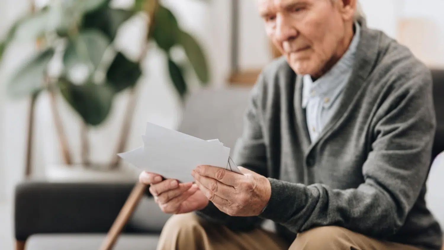 An elderly senior man experiencing Mild Cognitive Impairment