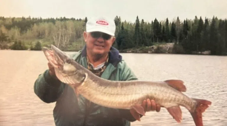 Clear Creek Memory Care resident Donnie McDonald enjoys a day of fishing - photo courtesy of Fayetteville Channel 5 News