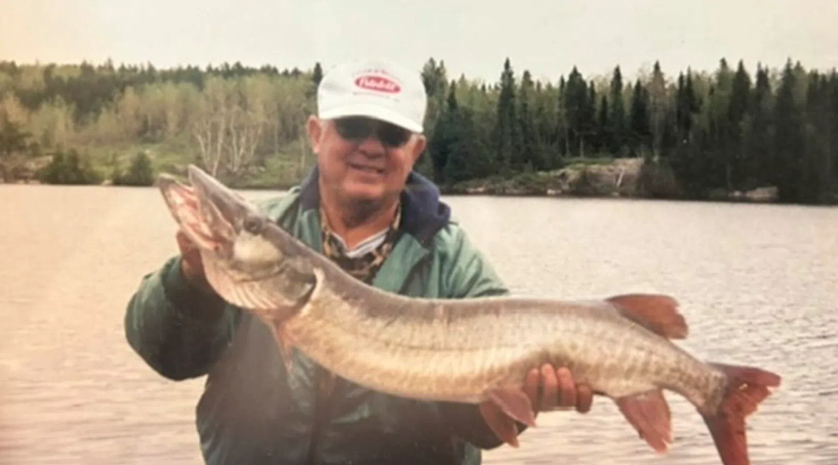 Clear Creek Memory Care resident Donnie McDonald enjoys a day of fishing - photo courtesy of Fayetteville Channel 5 News