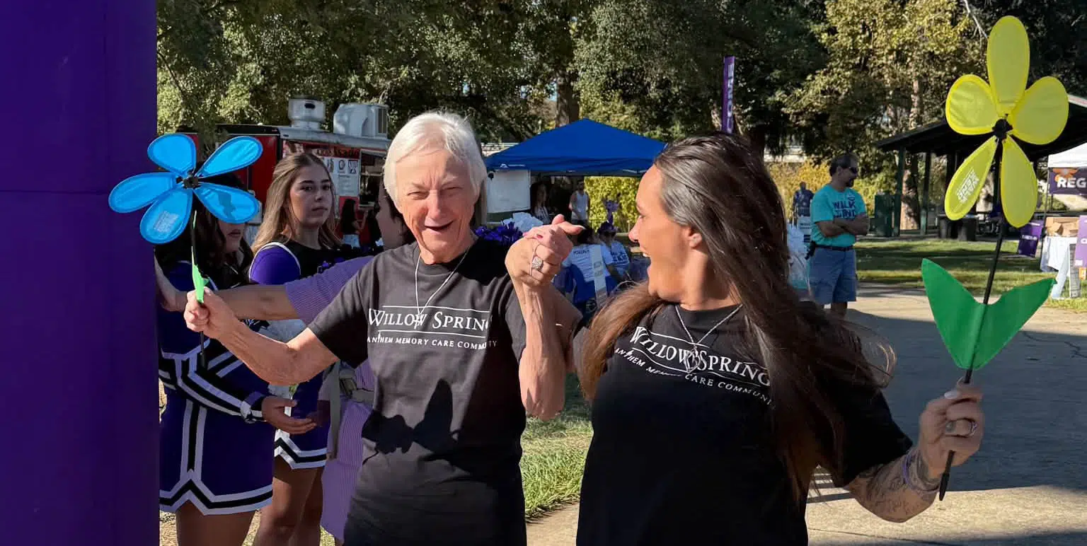 Willow Springs Memory Care resident and staff member walk to raise funds to End Alzheimers Disease